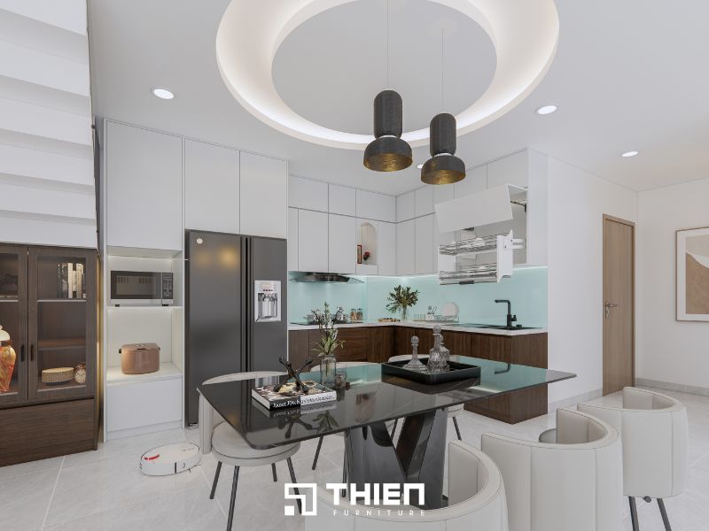Tủ bếp được thiết kế tone trắng chủ đạo làm tôn lên chất liệu gỗ tủ bếp